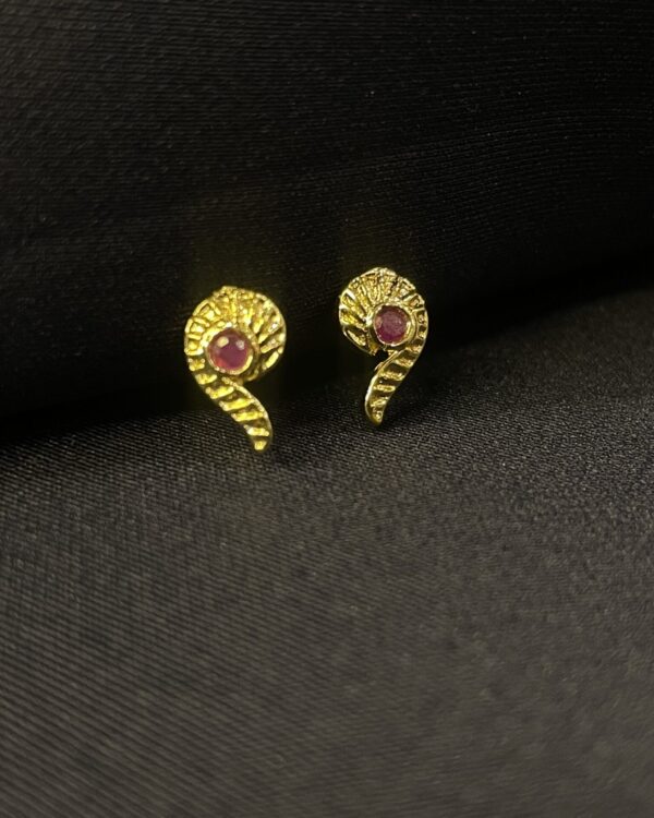 Gold-layered artificial studs