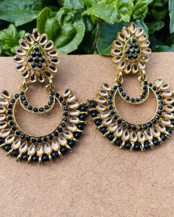 Gold-toned gemstone chandelier earrings with black beads