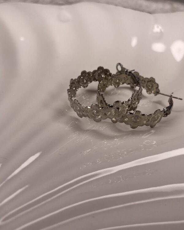 Silver-toned flower hoops