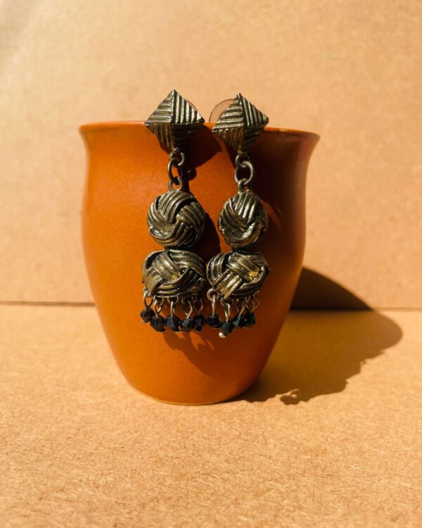Metal Rusted earrings with black beads