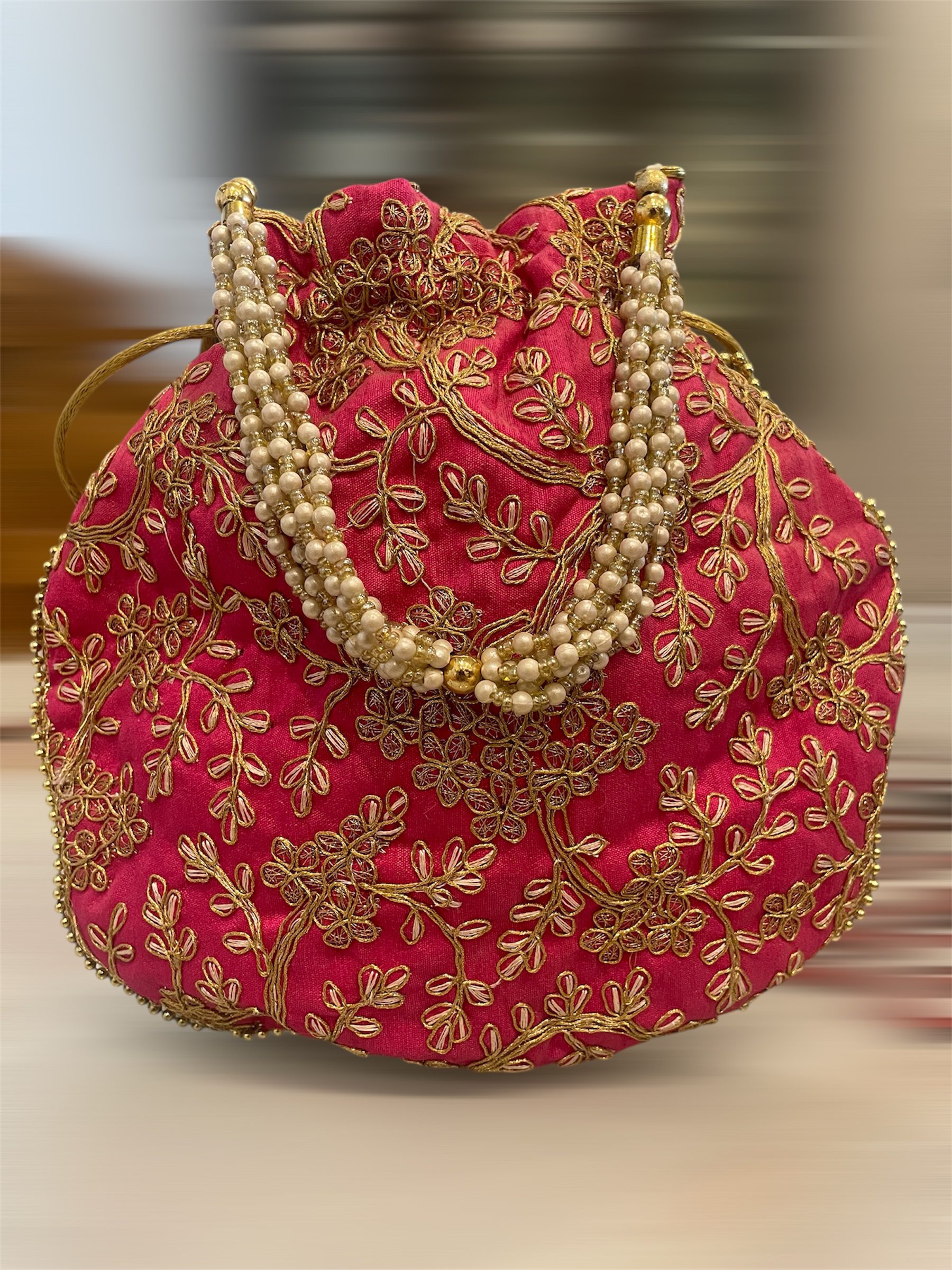 Embroidered Potli with Pearl & Gold beads hanging