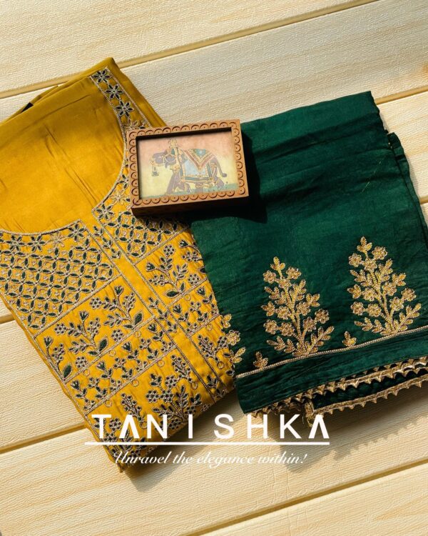 Muslin Suit with Golden Zari & Green Embroidery